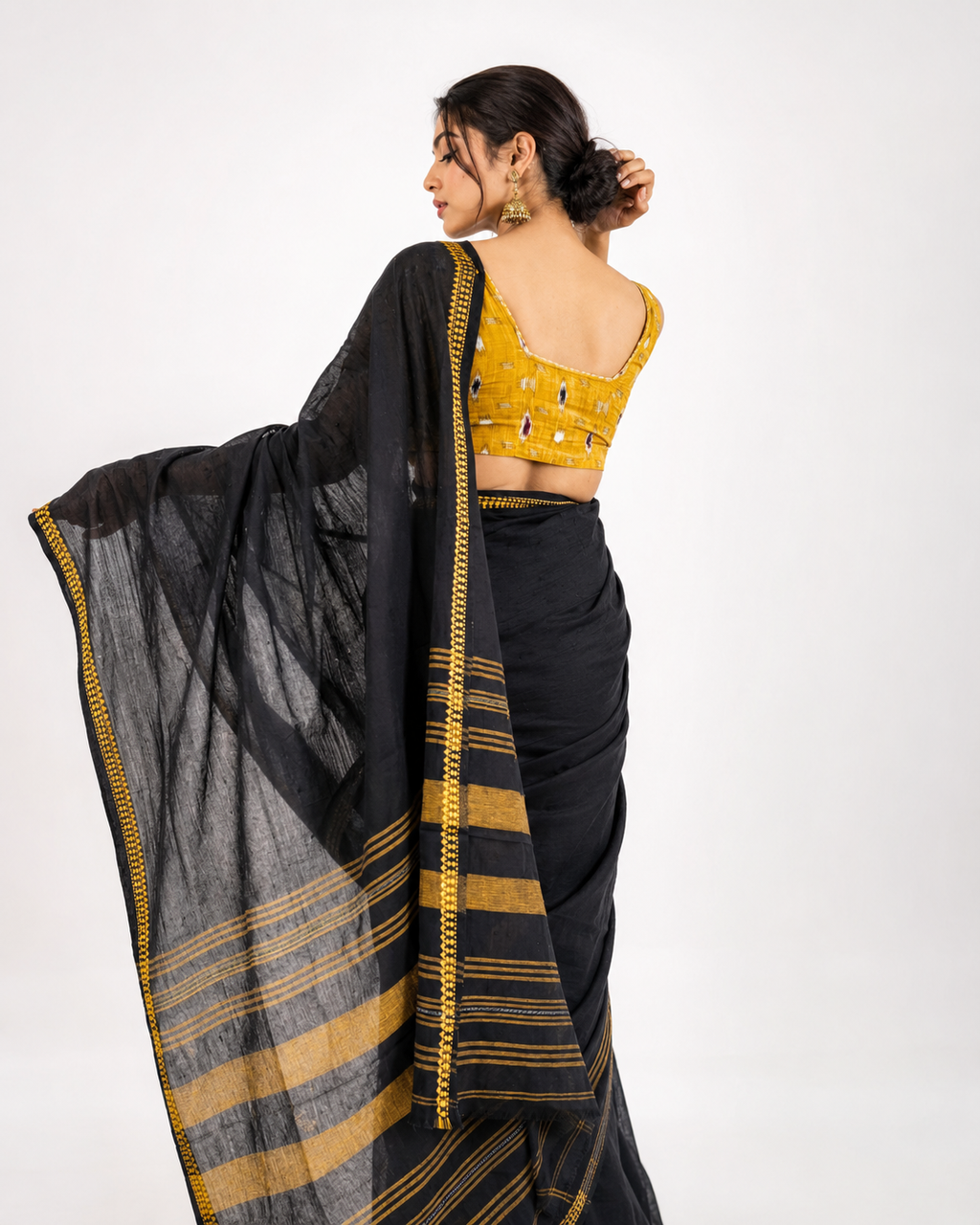 Taani Black And Yellow Temple Border Dhaniakhali Saree