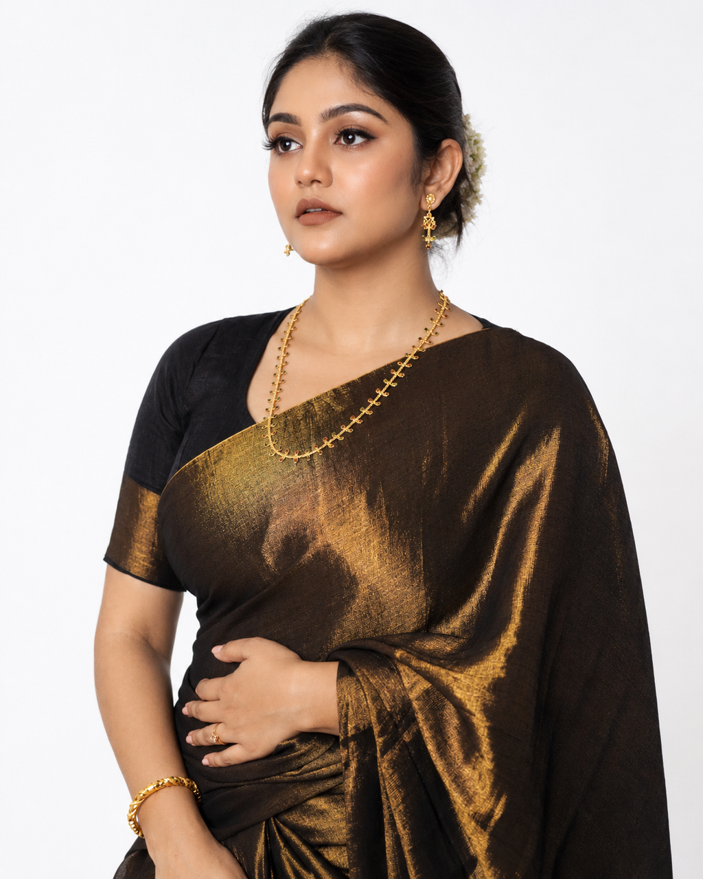 Daamini Tissue Silk Saree In Black