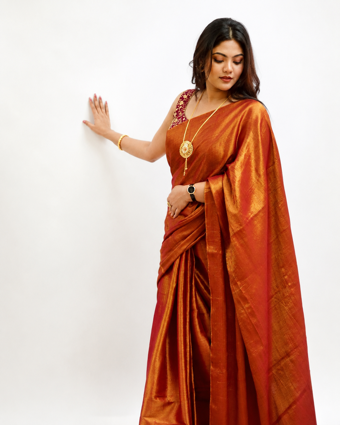 Raamya Tissue Silk Saree In Rusty Orange