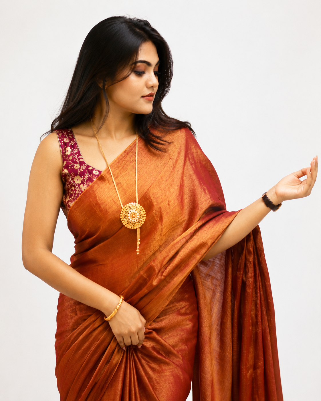 Raamya Tissue Silk Saree In Rusty Orange