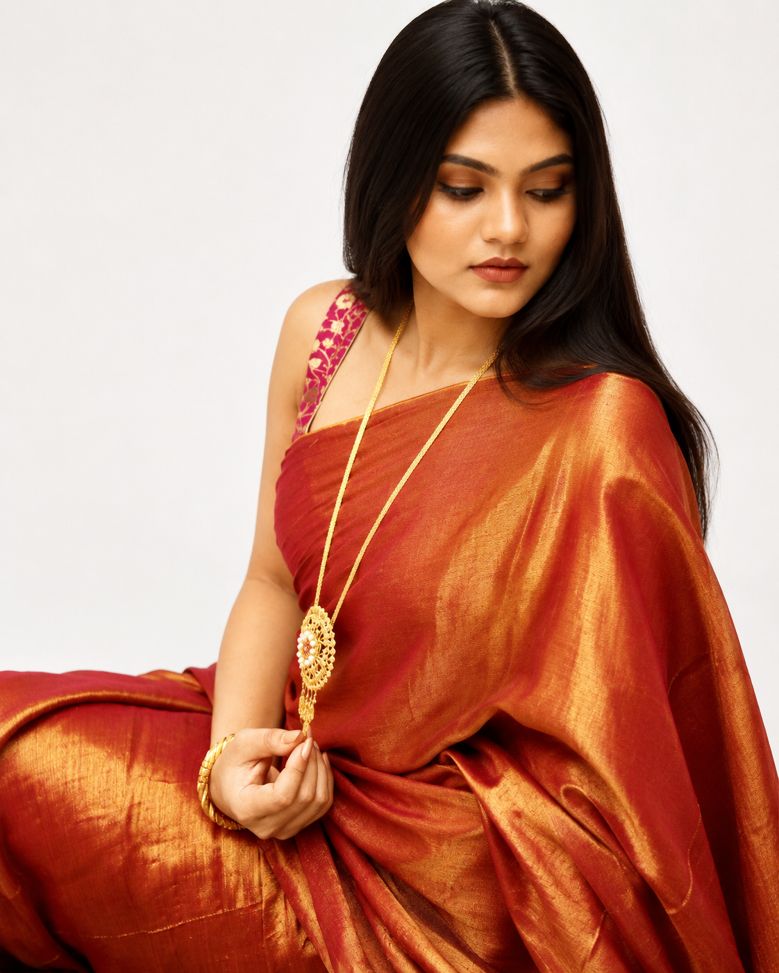 Raamya Tissue Silk Saree In Rusty Orange